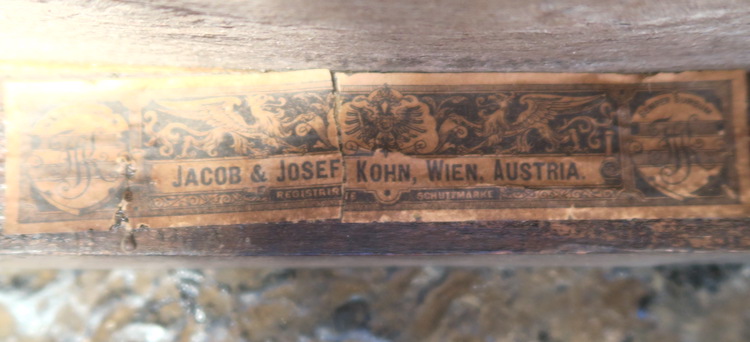 Photo of C221 label of J and J Kohn Bentwood Chairs